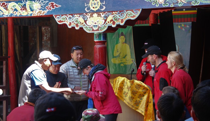 The Xtreme Everest team present their donation